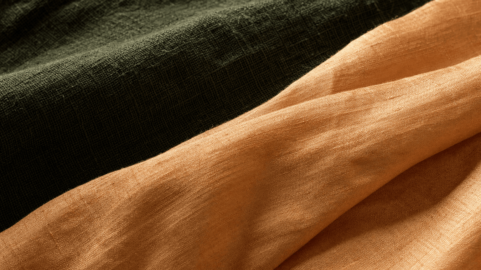 Warm peach silk on charcoal linen — atmospheric texture